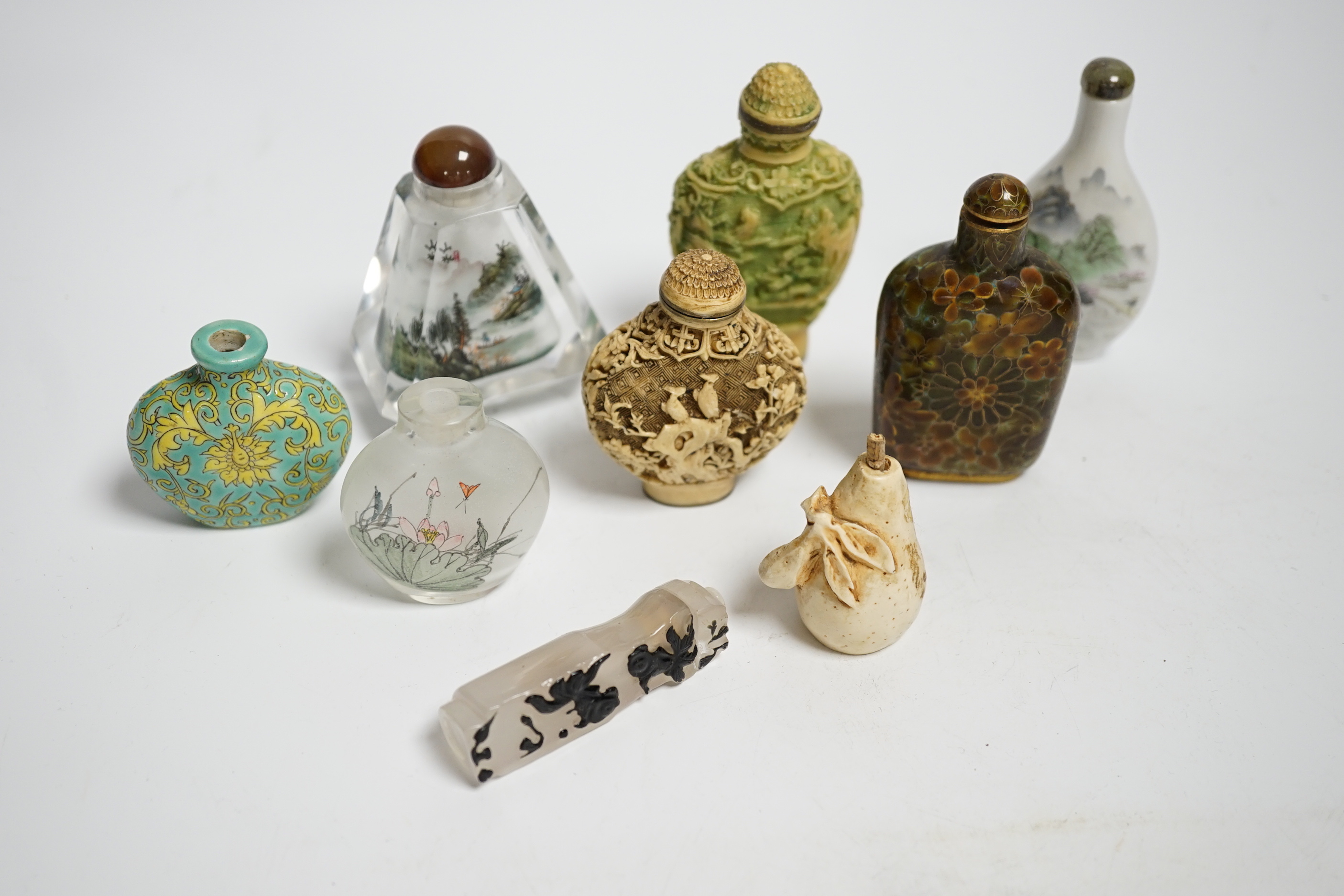 Nine various Chinese snuff bottles including porcelain, resin and glass, largest 8cm high
